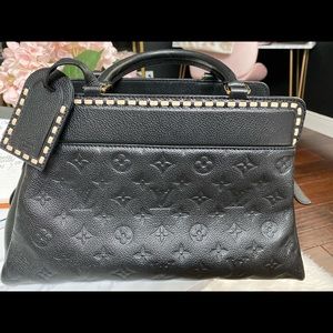 Louis Vuitton Vosges MM bag.  Mint Condition!